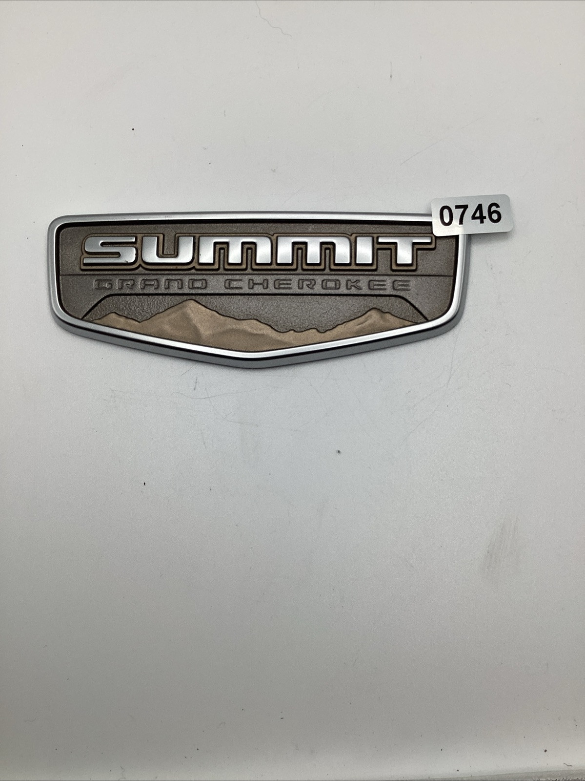 15-22 Jeep Grand Cherokee  Summit Rear Hatch Emblem Oem 55112660AA