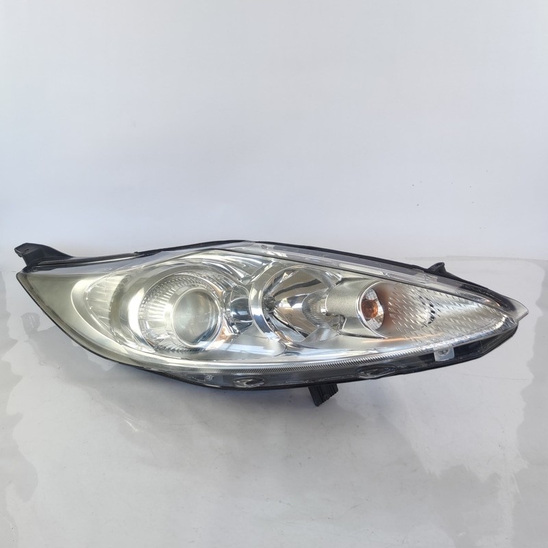 1740029 Proiettore DX FORD FIESTA (CB1) 1.2 16V (60Kw) Ber. 3p/b/1242cc