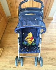 Winnie the Pooh Children's Play Stroller Doll Vintage Collectible