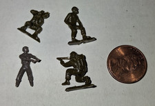 Lot of 4 Vintage WW II Hard Plastic Army Soldier Figures Olive Green Penny Size