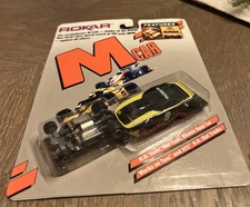 Rokar-Lifelike & M Car . Datsun  . Black/Yellow #9