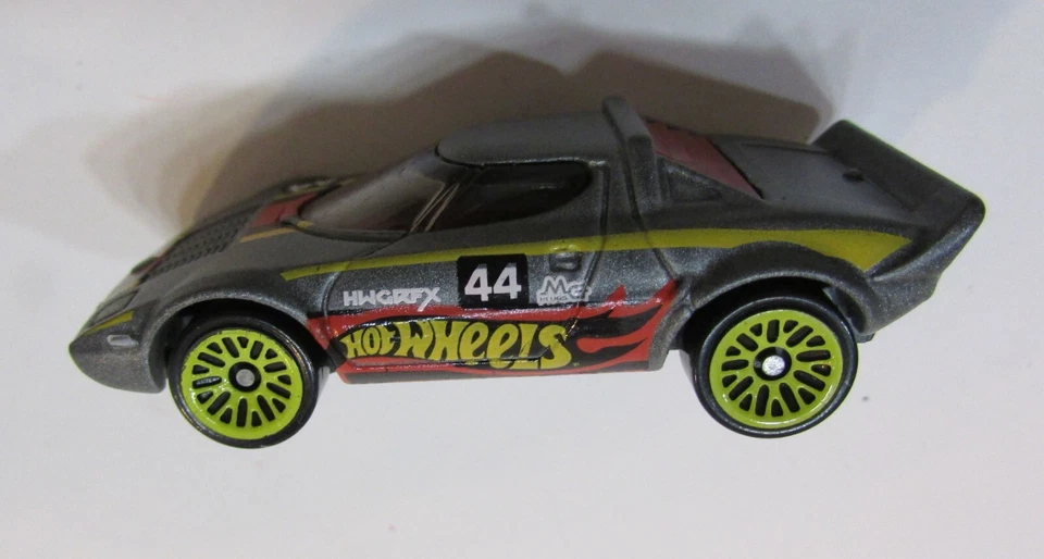 Coche de carreras de juguete fundido a presión Mattel Hot Wheels Lancia Stratos 2014 vintage gris 1:64 Foto 2 de 4