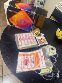 SEGA Dreamcast w two games, two controllers, and virtual memory card TESTED