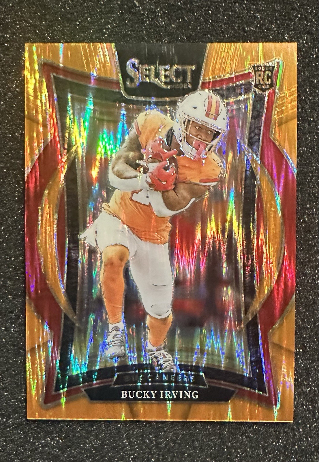 2024 Panini Select - Concourse Bucky Irving #4 Orange Shock Prizm /499 (RC)