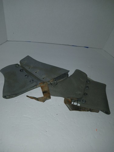 Antique 1920s or 1930s grey wool and leather spats, also known as gaiters.