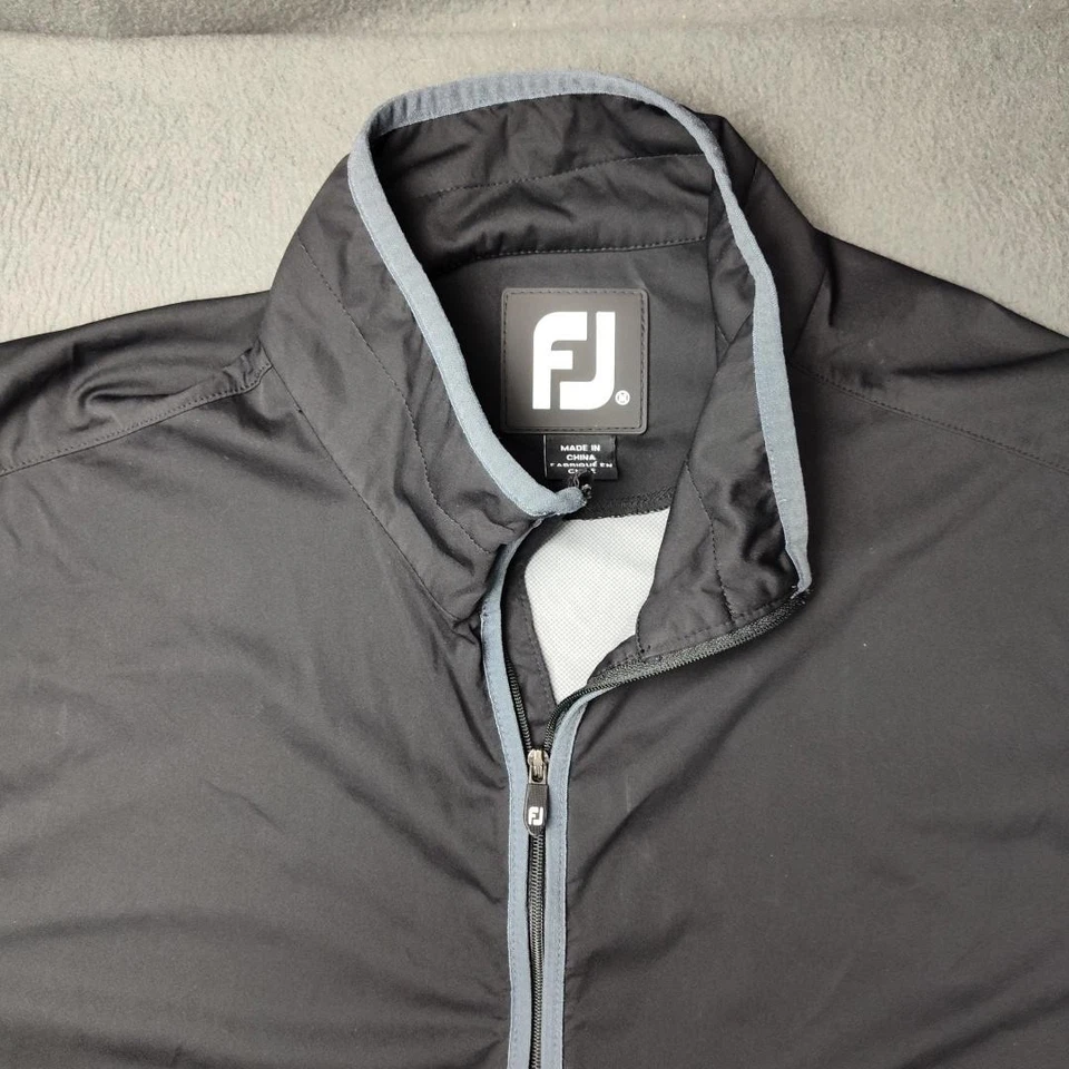 Chaleco cortavientos FootJoy para hombre gris medio cremallera completa golf rendimiento ligero Foto 2 de 4