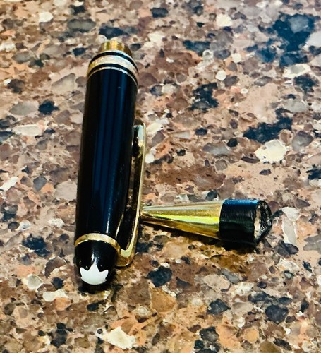 Mont Blanc ballpoint pen parts. Top and tip. Barrel is broken.