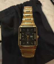 Citizen Quartz Gold Tone Rectangular Watch Bl...