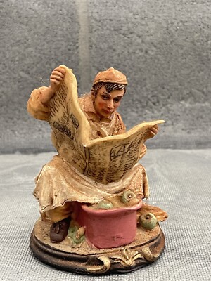 Vintage Resin Figure Sitting on Crate Working with Apples, Reading a Newspaper