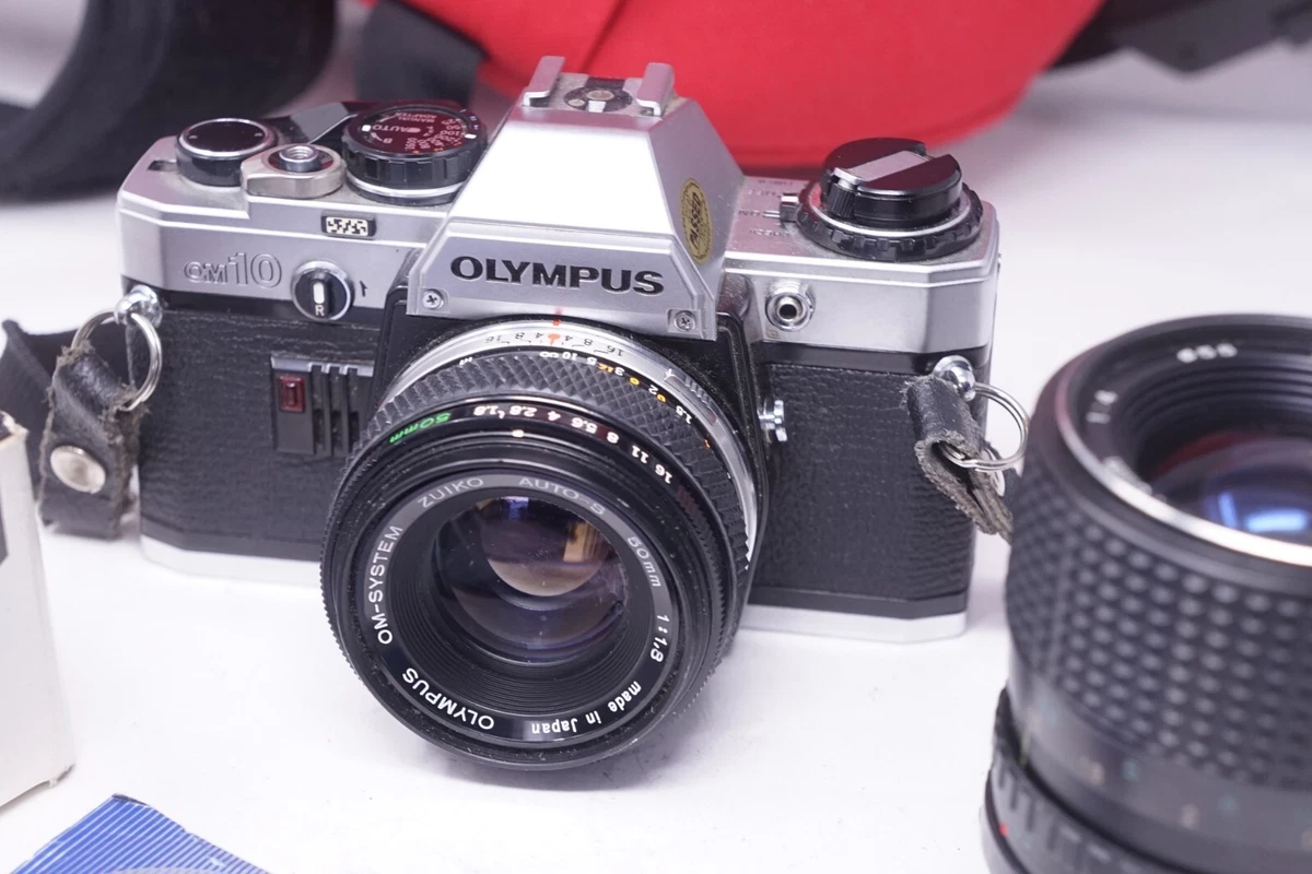VINTAGE OLYMPUS OM10 SLR FILM CAMERA WITH Tokina 35-75mm F/4 50mm F/1.8mm lenses