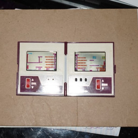 NINTENDO GAME AND WATCH MW-56 MULTI-SCREEN MARIO BROS. MADE IN JAPAN 1983.
