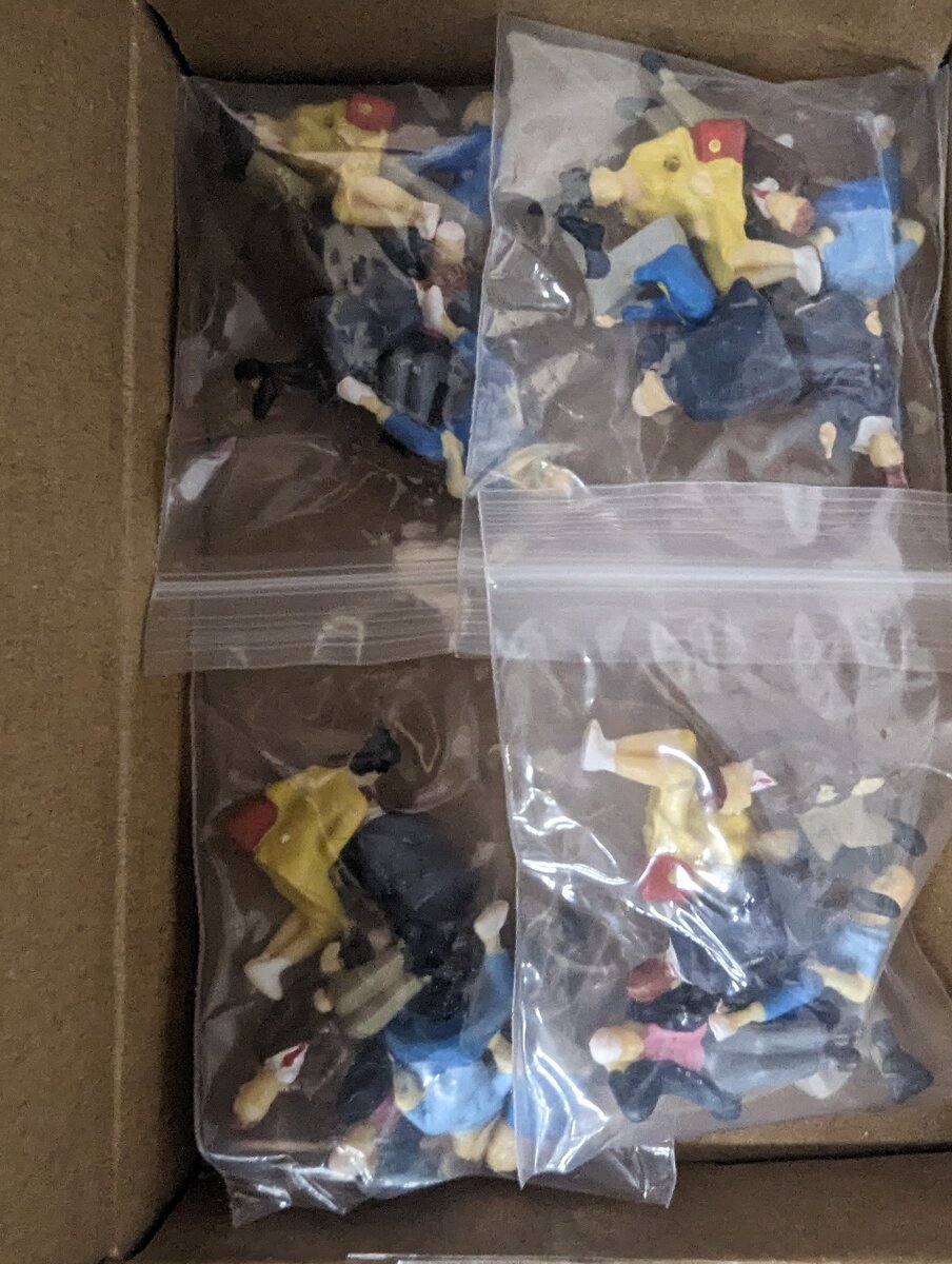 Trainz 1749 Assortment of Seated People Figures eBay