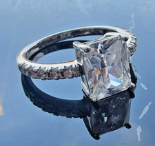 YGI 925 STERLING SILVER SPARKLING 9X7 MM. EMERALD SHAPE GEMSTONE RING SIZE 7