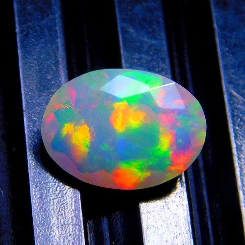 11x8mm Oval AAA Quality Faceted Ethiopian Opal Loose Calibrated Gemstone 1.75cts - Picture 2 of 4