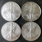 2006, 2009, 2012, and 2012 $1 American Silver Eagle Dollars