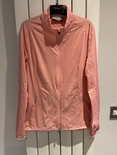 KJUS GOLF WOMEN&rsquo;S DELVIN STRETCH LIGHTWEIGHT JACKET PINK SMALL SAMPLE EXC. CON.