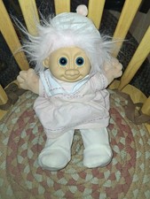 Soft Body Baby Doll with White Straight Hair, Pink Outfit, and Hat
