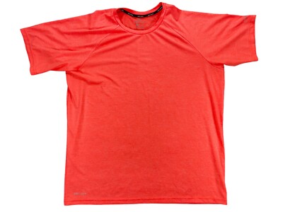 coral color nike shirt
