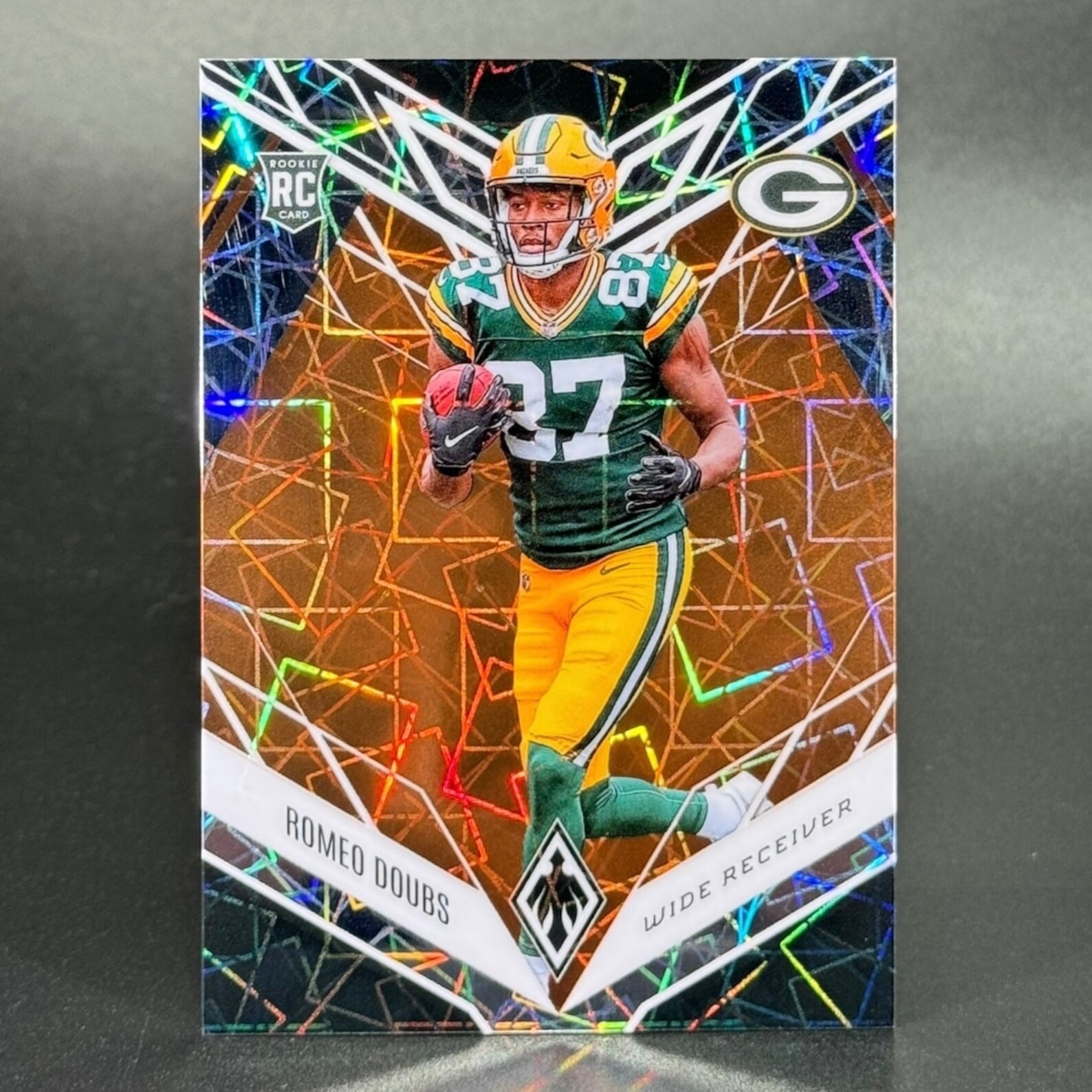 2022 Panini Phoenix Football #135 Romeo Doubs Rookie Orange Lazer /75 RC