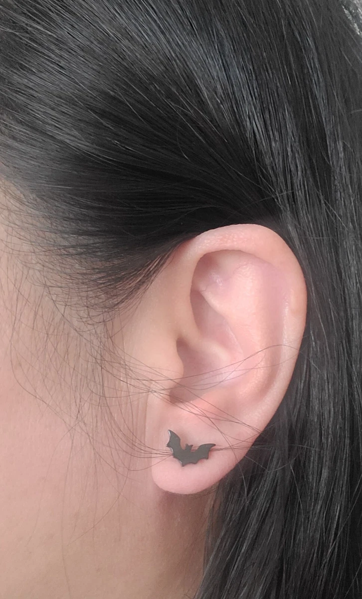 Tiny black store stud earrings