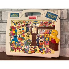 Vintage Fisher-Price Talk'n Teach Tag Along Sesame Street The Counting Toy Store