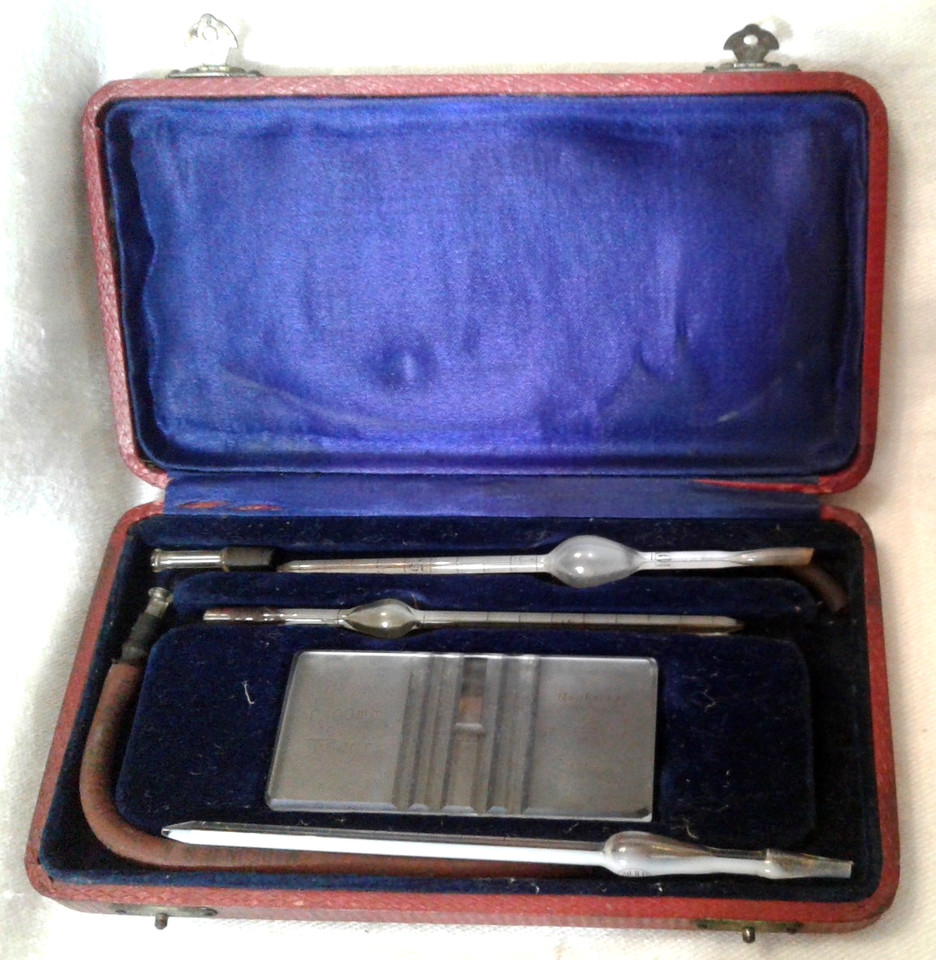 A vintage haemacytometer (blood cell counting slide) in its original velvet-lined case — morbidly fascinating medical history you can hold in your hand.