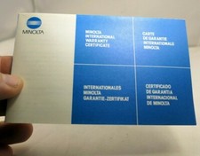 MINOLTA warranty information for Maxxum 70-210mm f4 AF lens