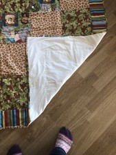 Handmade unisex jungle pattern Baby quilt 50 X42 . New Fabric  white back.