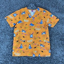 The Wonderful World Of Disney Halloween Eeyore Women  s S Scrub Top Orange