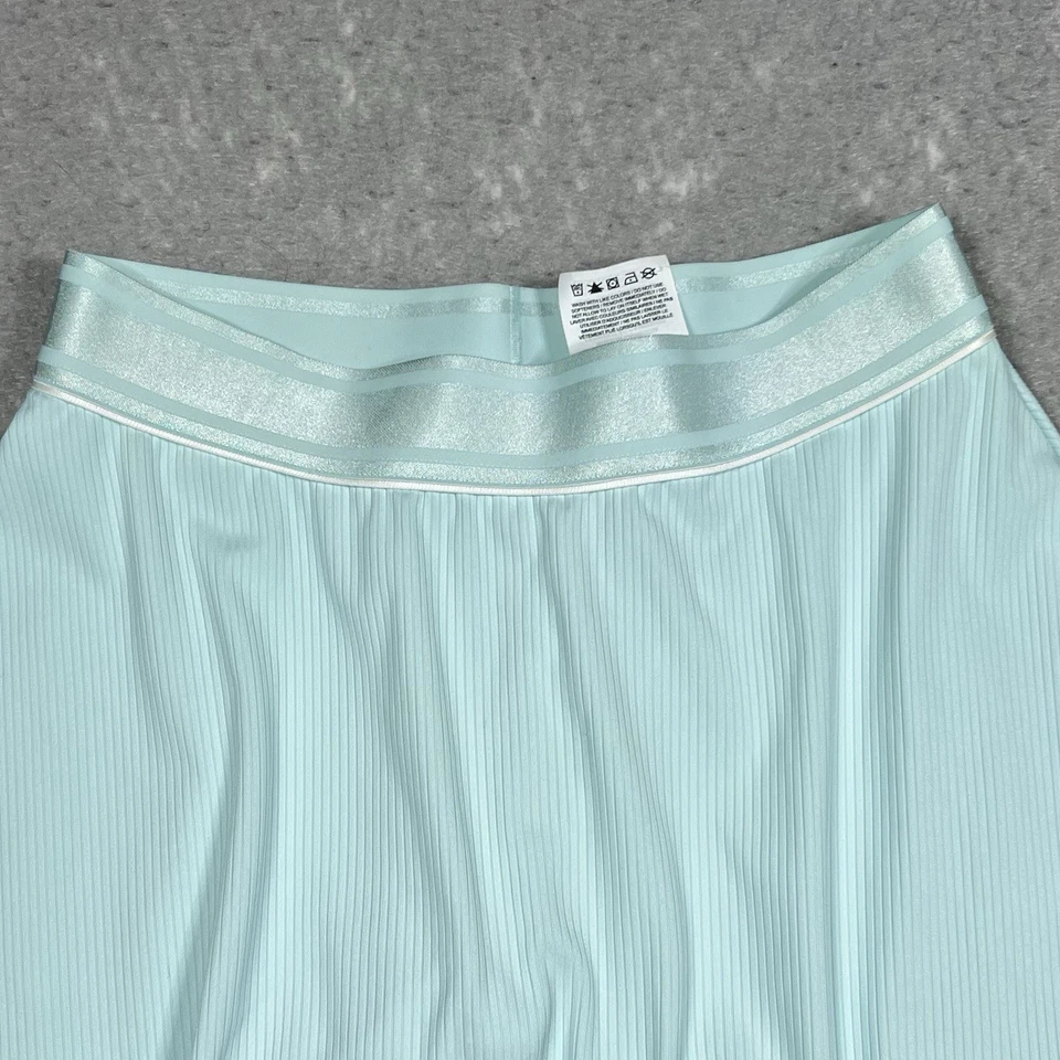 Falda corta de tenis Nike Court Dry con volantes verde aguamarina para mujer pequeña 939318-336 Foto 2 de 4
