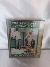 NEW 1000 Pc Jigsaw PUZZLE Saturday Evening Post Norman Rockwell Before the Shot