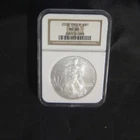 2003 AMERICAN SILVER EAGLE. NGC MS69. BROWN LABEL IN OLD FATTY HOLDER. LOOK!!!