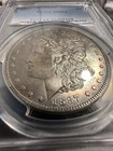 1887 $1 Silver Morgan Dollar. Beautiful & Unique Sunset Toning, PCGS Graded MS64
