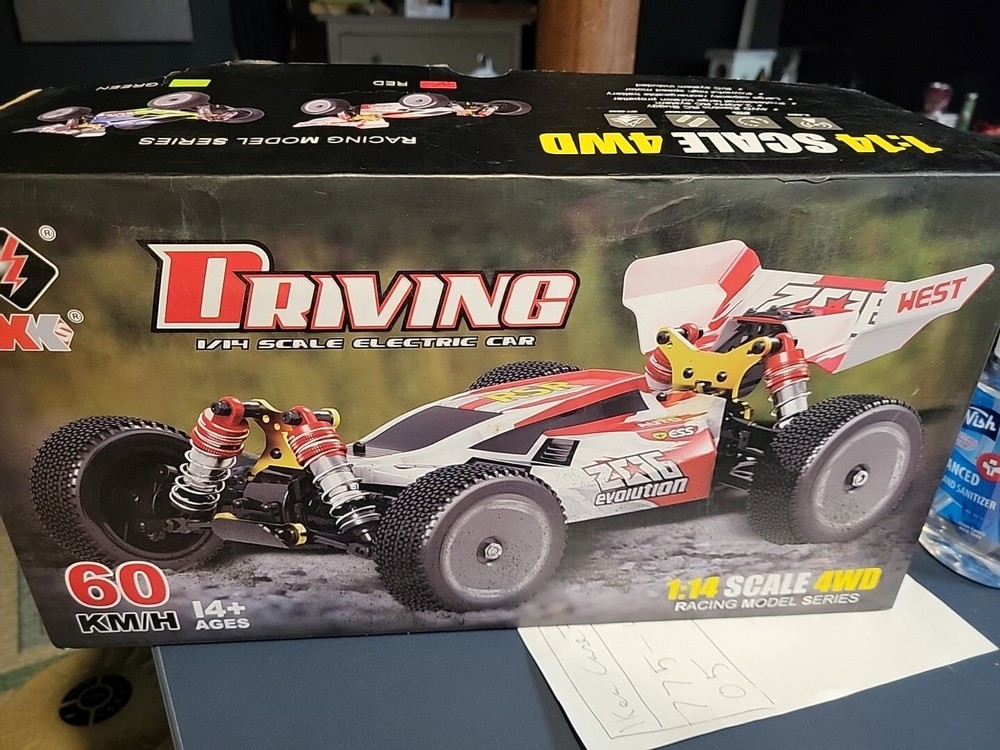 Driving 1/14 Scale Electric Racing Car 60KM/H Brushless Motor 4WD Buggy...