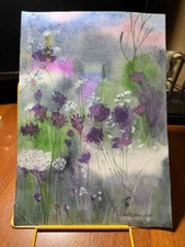 calm watercolor landscape with meadow flowers in bokeh style in summer shades