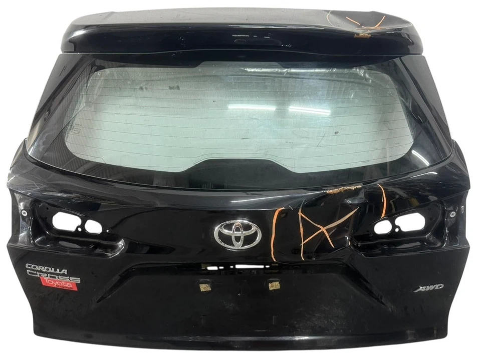 Toyota Corolla 2022-2024 tapa maletero cruzado puerta trasera negro OEM Foto 2 de 4
