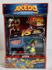 Akedo Ultimate Arcade Warriors Axel vs Epic Miss Slither Battle Action Figures