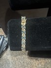 Tennis Bracelet W/ 1 Diamond Accent (R) 7” Gold Over Sterling Silver Blue Topaz