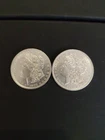 2 Morgan Silver Dollars  1879, 1880