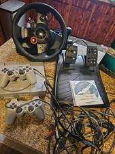 Sony Playstation With Controllers And Driving...