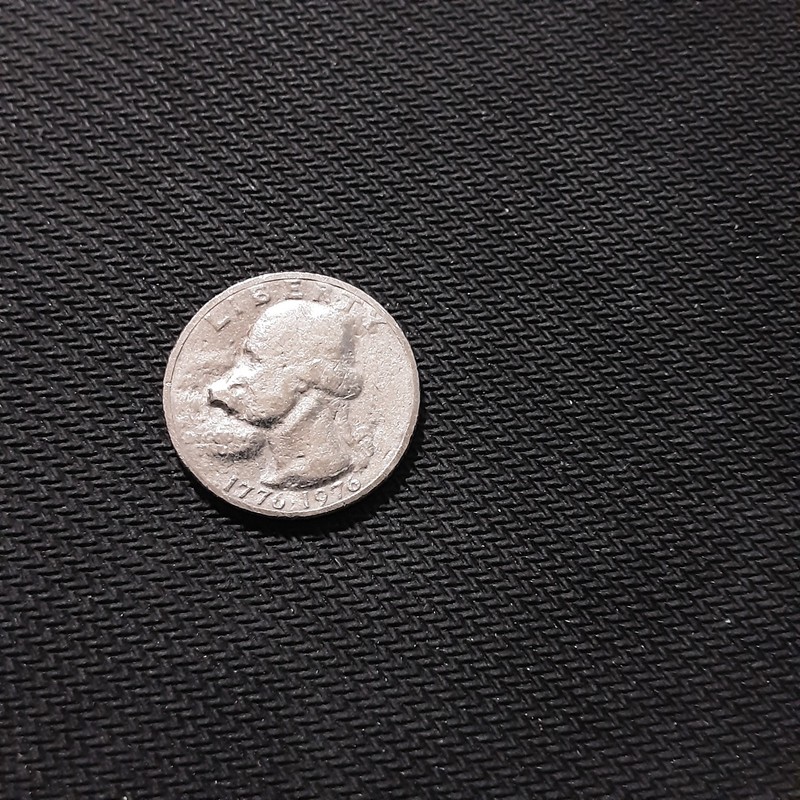 1976 Quarter Error, I think it has to do with gas during the plating process