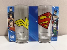 DC COMICS AUCHON SUPERHERO LOGO DRINKING GLASS SET/2 SUPERMAN WONDER WOMAN