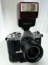 Canon AL-1 QF 35mm SLR F.C w/ 35-70mm Lens.C.S 277T flash,motor winder.UNTESTED!
