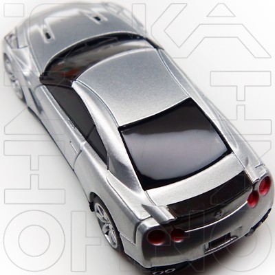 NISSAN GT-R R35 PROTO RACING SPIRIT COLLECTION UCC 1:64 SILVER