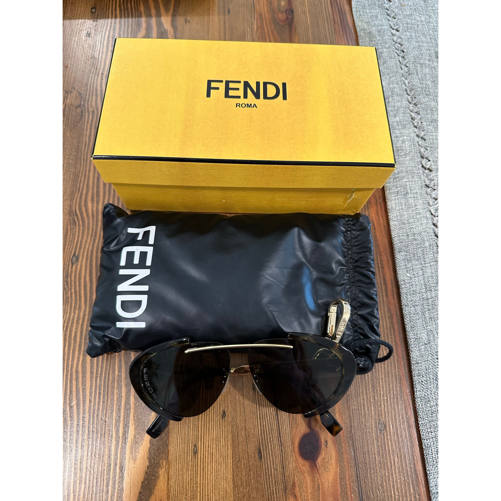 Fendi Cat Eye Sunglasses with Chic Gold Accents-image