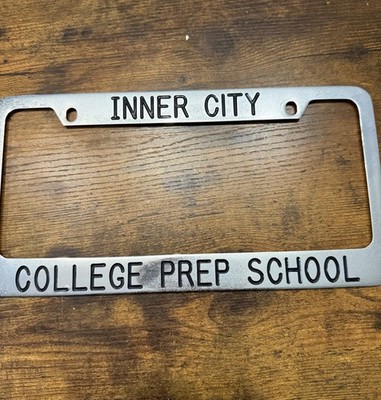 VINTAGE INNER CITY COLLEGE PREP SCHOOL LICENSE PLATE STEEL FRAME BEZEL