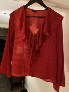 red ruffle neck blouse