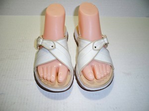 white cross sandals