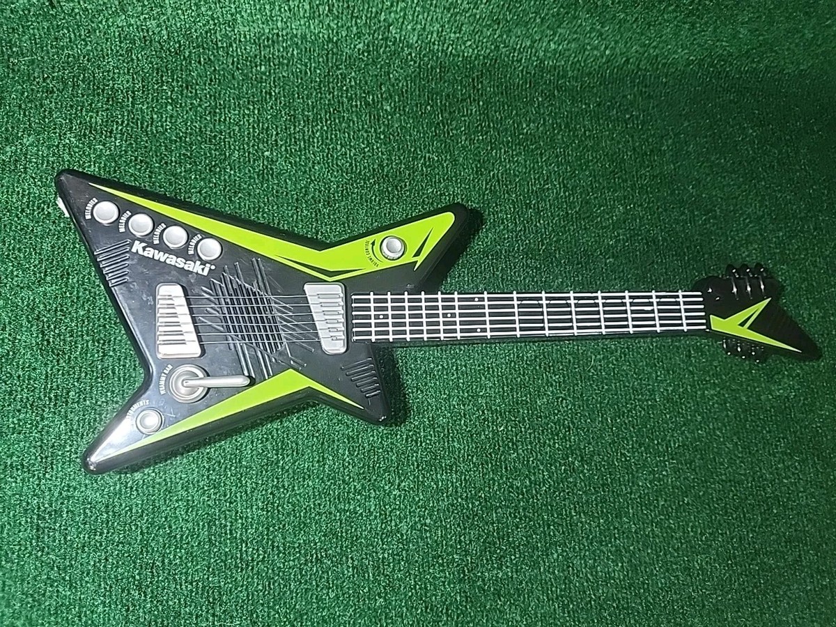 Vintage 1990's Kawasaki Toy Guitar Green and Black Tested Vintage 1990's Kawasaki Toy Guitar Green and Black Tested