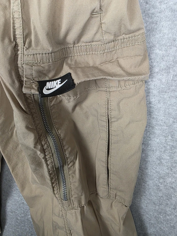 Pantalones Nike Para Hombre Medio Bronceado Carga Joggers Cintura Elástica Cremallera Bolsillo Tobillo Puños Foto 2 de 4
